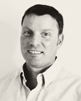 Edward G. Rainford, AIF® — black and white portrait.